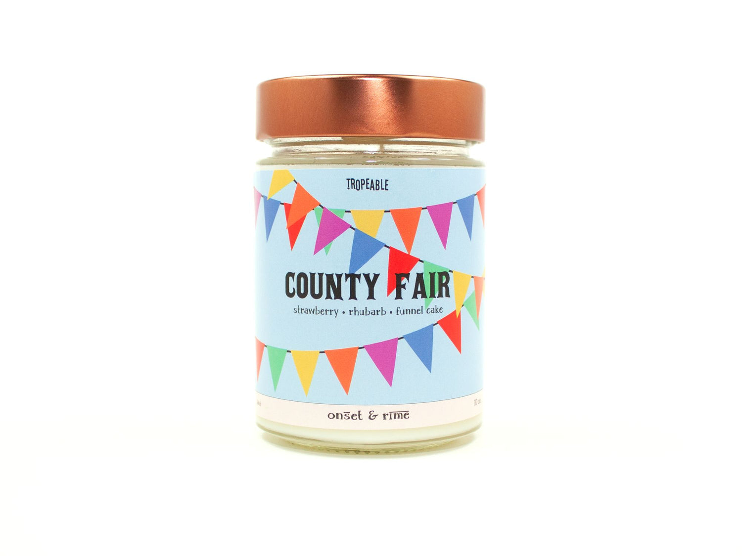 Onset & Rime strawberry rhubarb funnel cake scented candle called "County Fair" in a 10 oz glass jar with copper lid. The label has a light blue background with colourful pennant banners. The text on the label is "County Fair - Strawberry, Rhubarb, Funnel Cake".